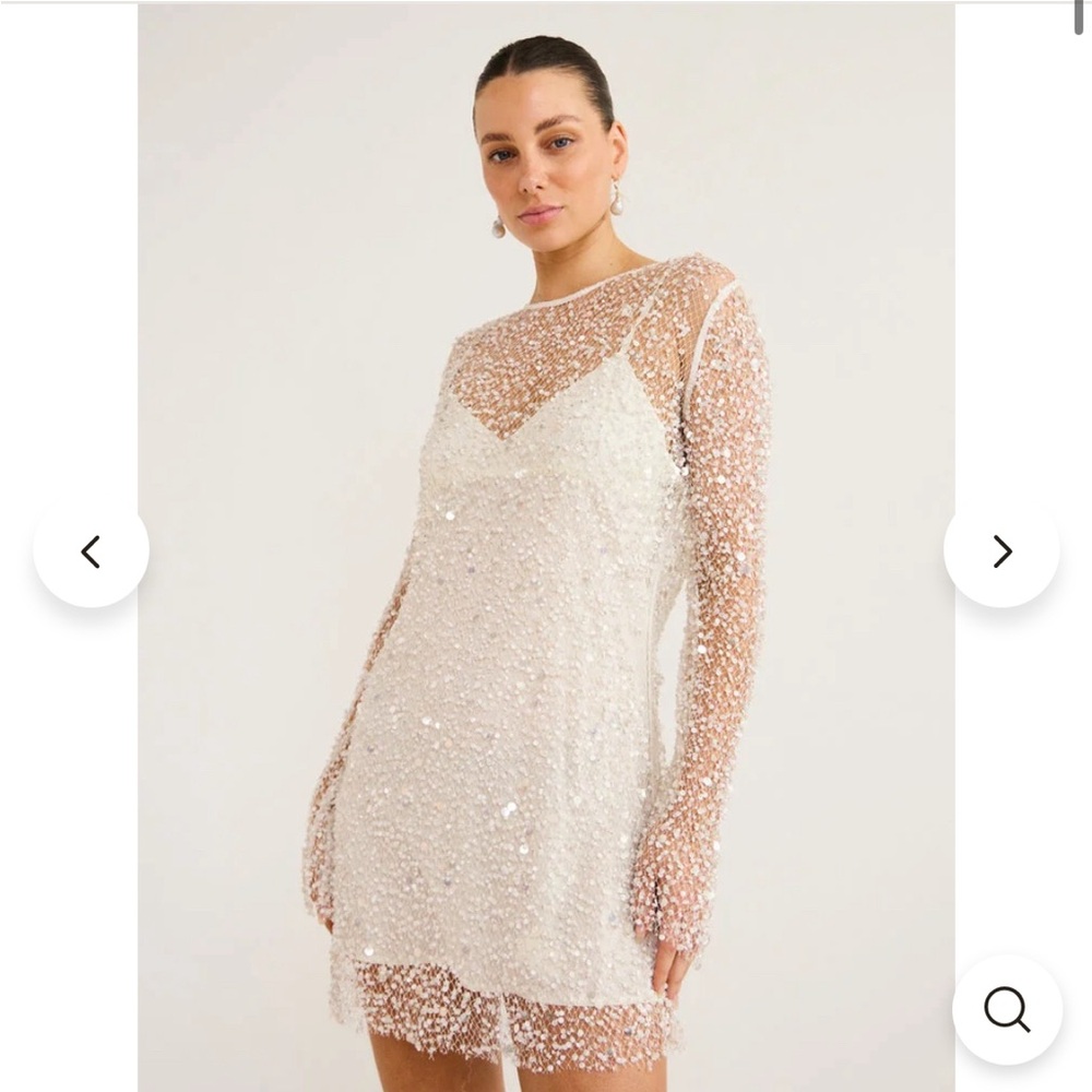 Crystal embellished white mini dress